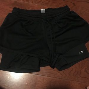 Black running shorts with spandex underneath